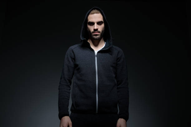 istock cool sporty man wearing hood on 1171718684