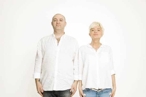 istock Pregnant woman with her husband over white background 1171720388