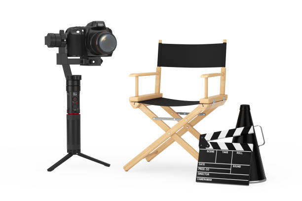 istock Cinema Industry Concept. DSLR or Video Camera Gimbal Stabilization Tripod System near Director Chair, Movie Clapper and Megaphone. 3d Rendering 1171720907