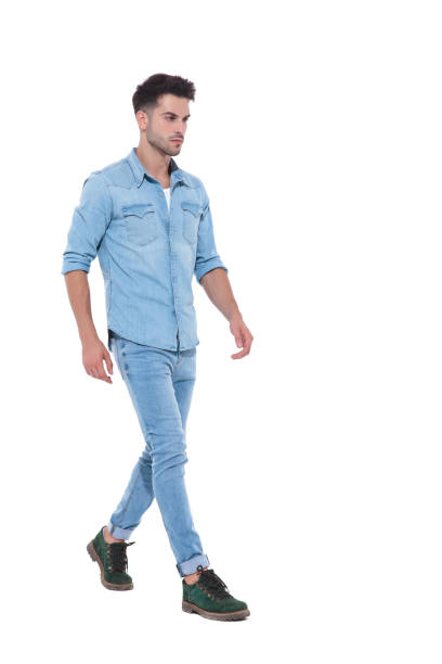 istock powerful and confident man wearing denim and walking 1171722446