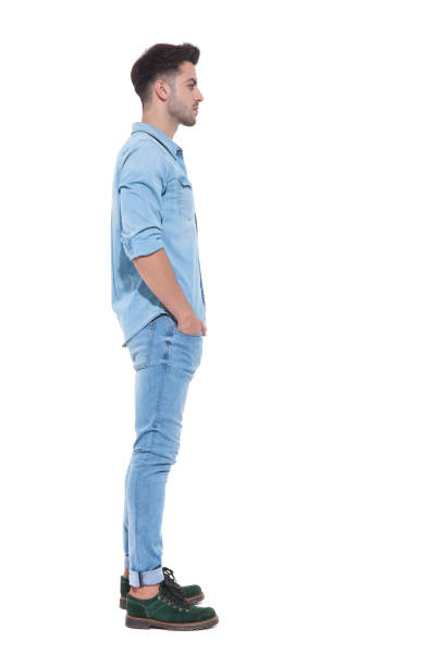 istock side view of attractive man holding hands in his pockets 1171722651