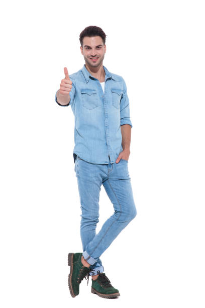 istock casual man wearing a denim outfit making thumbs up sign 1171722711
