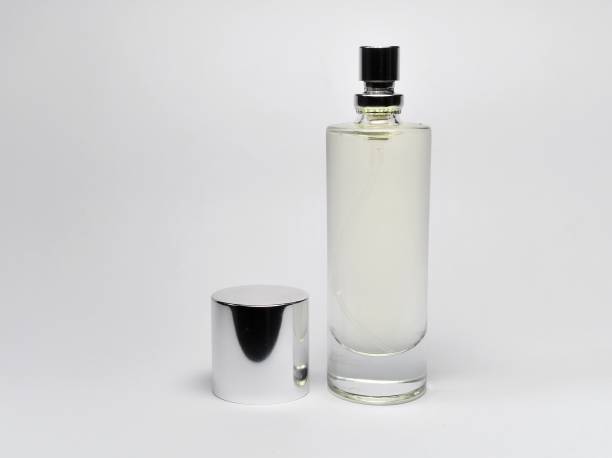 istock Bottle of perfume on white background 1171724031