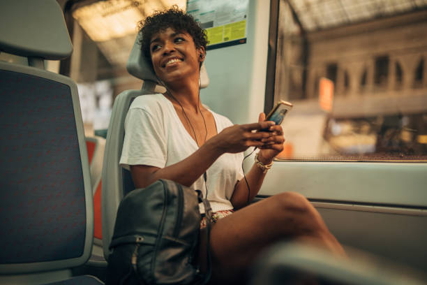 istock Beautiful young lady riding in train 1171725758