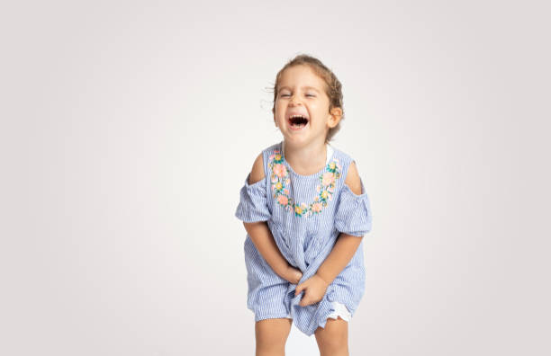 istock Happy baby girl possing over white background 1171725818