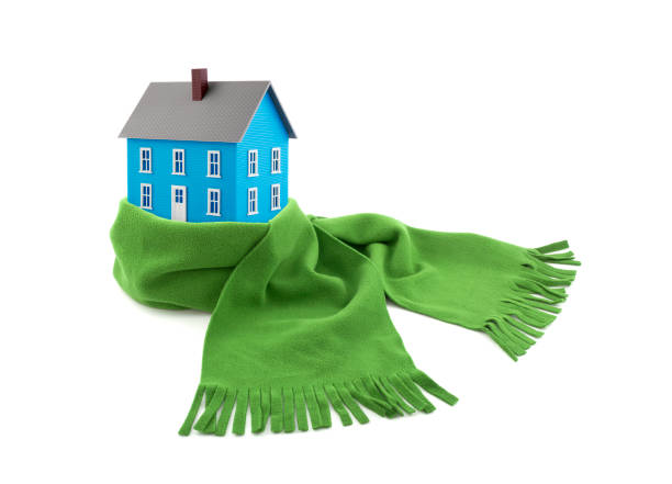 Blue house wrapped in a scarf isolated on white stock photo
