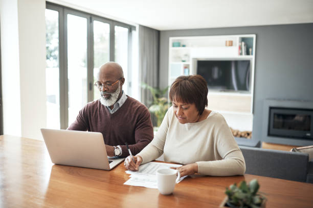 istock You use the laptop and I'll crosscheck here 1171730446