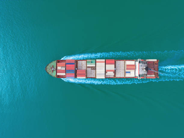 istock Aerial top view container ship for logistics, import export, shipping or transportation. 1171734616