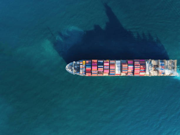 Aerial top view container ship for logistics, import export, shipping or transportation.