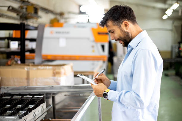 istock The engineer oversees the process of working in an electrical workshop,stock photo 1171736522