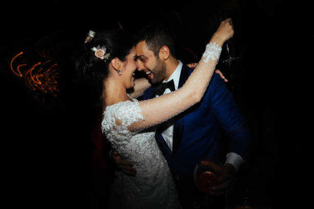 Bride and groom dancing during their wedding party Bride and groom dancing during their wedding party drunk photos stock pictures, royalty-free photos & images