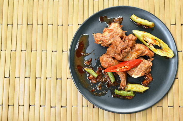 istock spicy stir fried pork bone with chili and Chinese long bean 1171739984