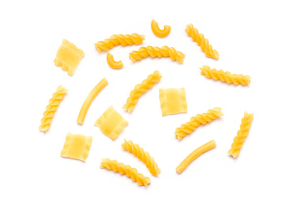 Italian Pasta, raw Italian pasta isolated on white background Italian Pasta, raw Italian pasta isolated on white background carbohydrate food type photos stock pictures, royalty-free photos & images