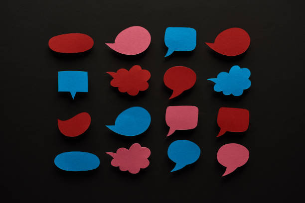 istock top view of empty speech bubbles on black background, cyberbullying concept 1171745971