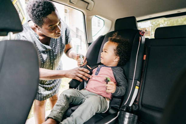 Very Important passenger Mother and son sitting in a car rocket booster photos stock pictures, royalty-free photos & images