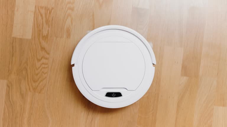 A small robot vacuum cleaner at home