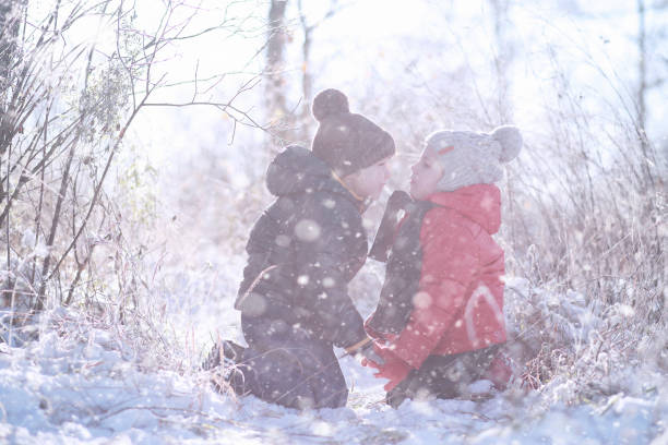 istock Kids walk in the park first snow 1171747646