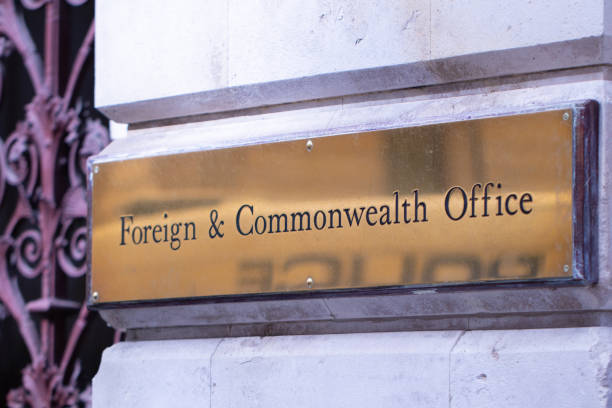 Foreign & Commonwealth brass plaque outside the offices in Westminster, London stock photo