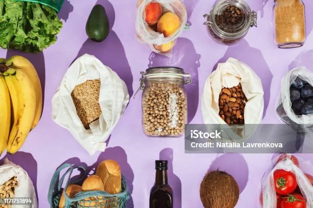 Zerowaste Healthy Grocery Shopping Concept Pulses Fruits Greens And Vegetables In Mesh Net Or Cotton Bags And Glass Jars Stock Photo - Download Image Now