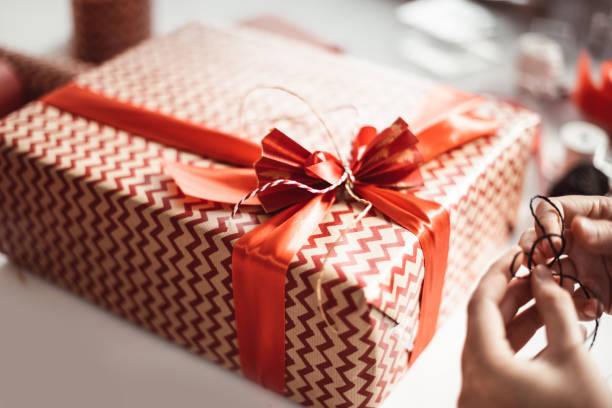 istock christmas present on parquet floor 1171752834