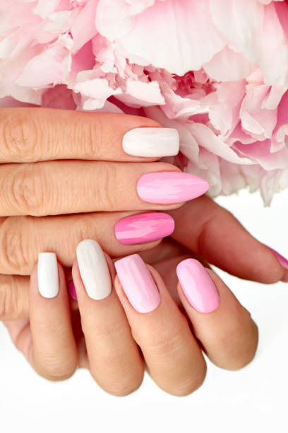istock Light pink, pastel manicure on various shapes of nails 1171753314