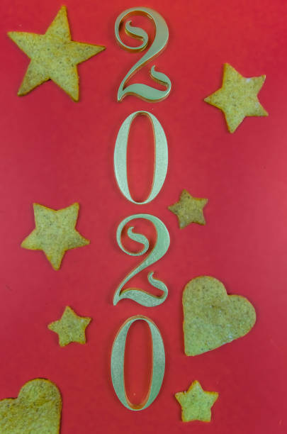 istock Christmas, New Year's red background. gingerbread. 2020 year 1171754835