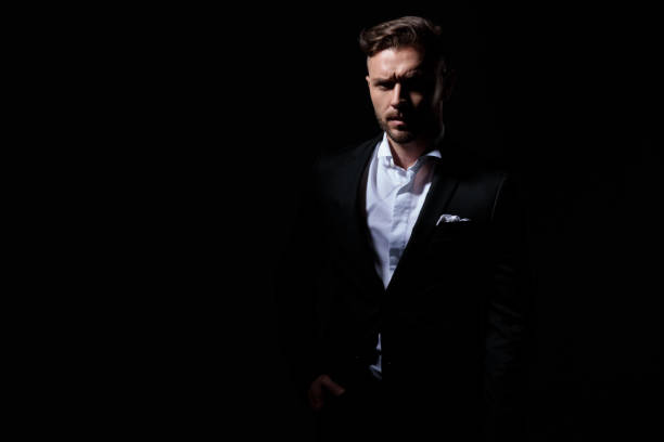 istock business man in tuxedo looking confidently at camera 1171754935