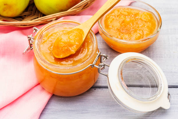 istock Apple jam, jam, chutney in a glass jar. Homemade preservation concept 1171755009