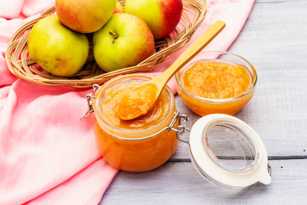 istock Apple jam, jam, chutney in a glass jar. Homemade preservation concept 1171755413