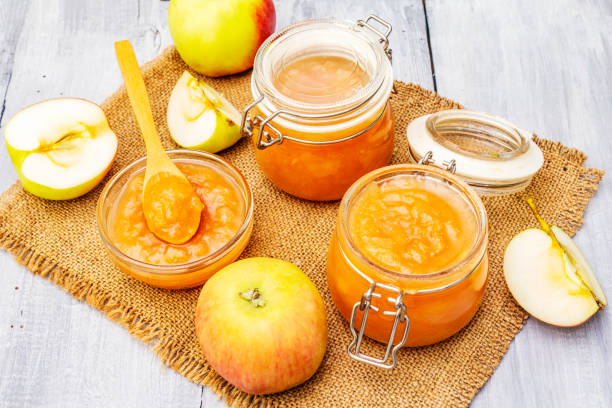 istock Apple jam, jam, chutney in a glass jar. Homemade preservation concept 1171755593