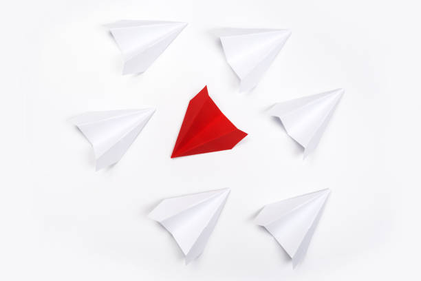 istock Red paper plane are different from others on white background. Think different. Business for innovative, solution concepts 1171760261