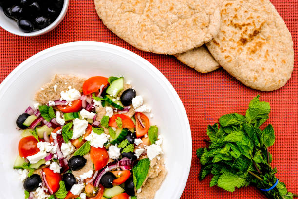istock Fresh Healthy Greek Salad With Pitta Bread 1171760407