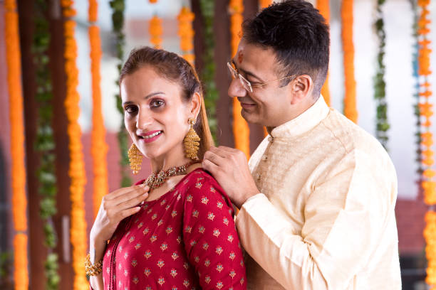 istock Indian couple in traditional clothing 1171760621