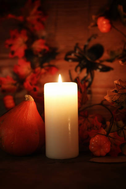 istock table decorations for Halloween carved pumpkin head candles 1171765189