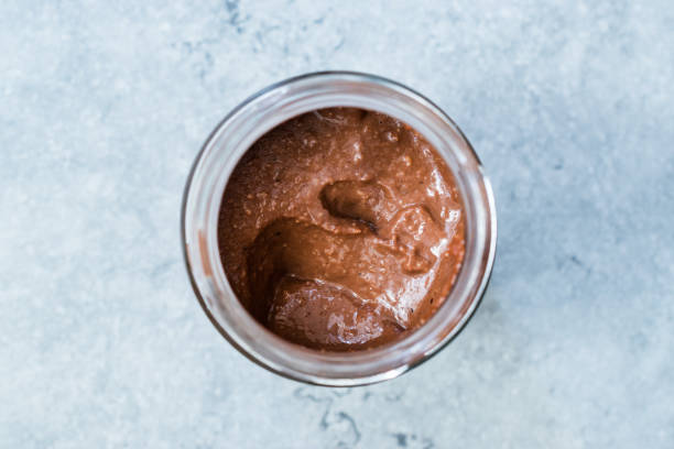 istock Homemade Organic Raw Nut Chocolate Cream in Jar. 1171767747