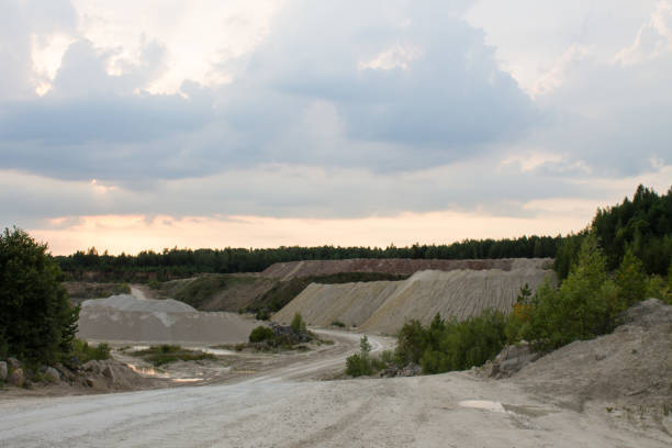 istock Old limestone quarry in Russia at sunset in summer 1171775104