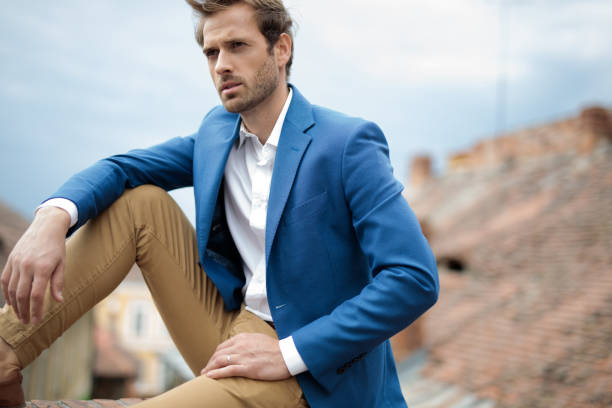 istock fashion man dreams away while sitting 1171778198