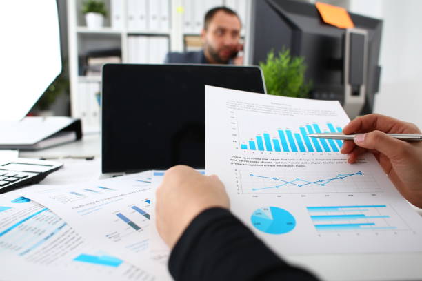 istock businesswoman study documents in office closeup 1171779028