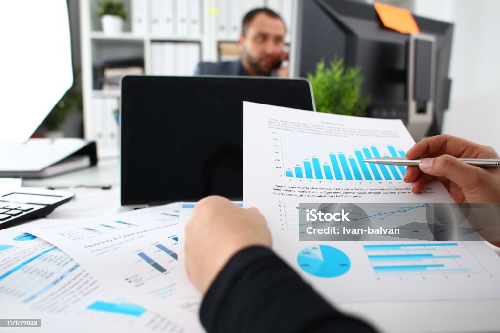 Study Documentsa Businesswoman Study Documents In Office Closeup Stock Photo - Download ...