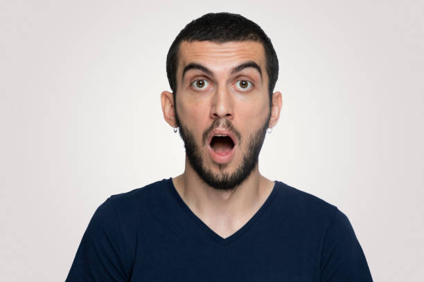 istock Portrait of shocking handsome man looking at camera 1171781404