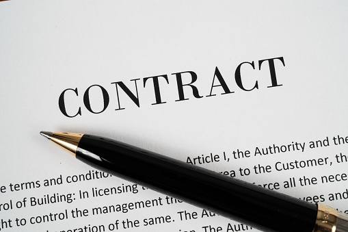 Close up of a Contract with pen ready to be signed