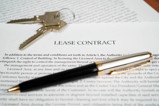 istock Lease contract with a pen and house keys 1171783981