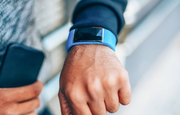 istock Sportsman checking his smart watch 1171787456