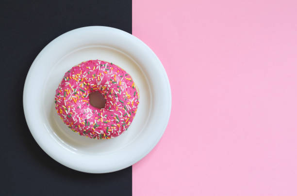 istock Pink donut in plate 1171788798