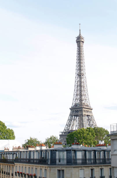 istock Old building in front of the Eiffel Tower in Paris 1171792319