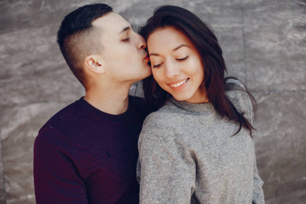 istock Couple in a winter park 1171797066