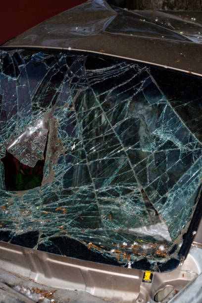 istock After the car crash, windshield fall on the road surface. 1171797959