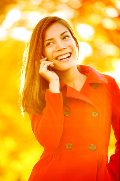 istock Smartphone Autumn woman talking on mobile phone 1171799169