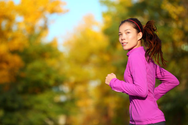 istock Aspirations - Aspirational woman runner running 1171799568