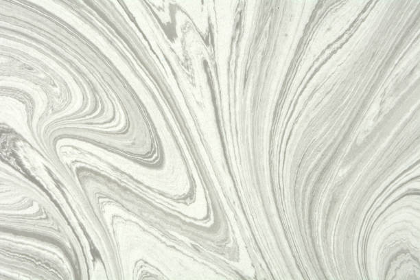 istock Mix of a white and black paint, closeup. Abstract marbling texture. Handmade ebru technique. 1171799649